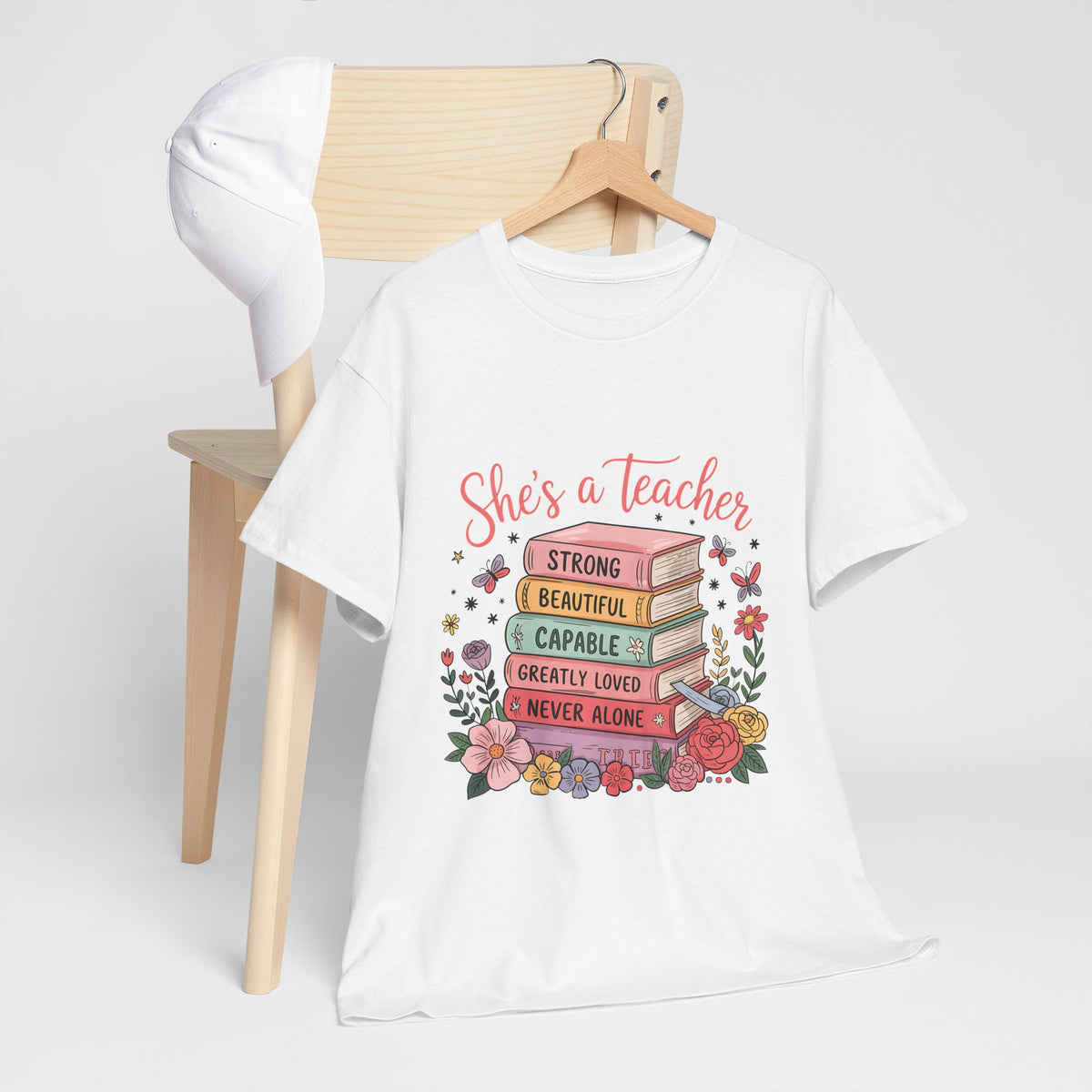 "She's a Teacher" Unisex Heavy Cotton Tee